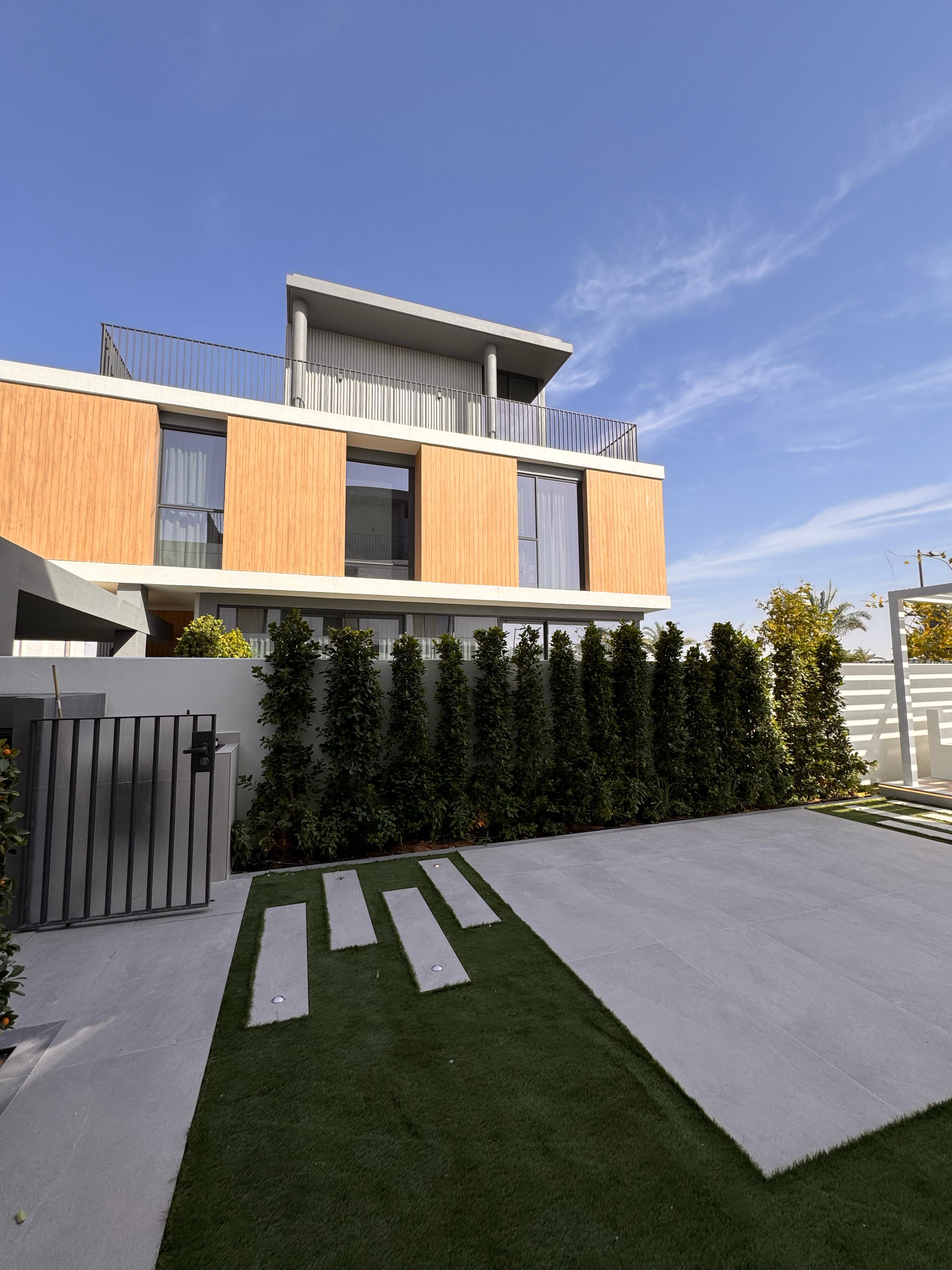 Modern house at night with glass walls