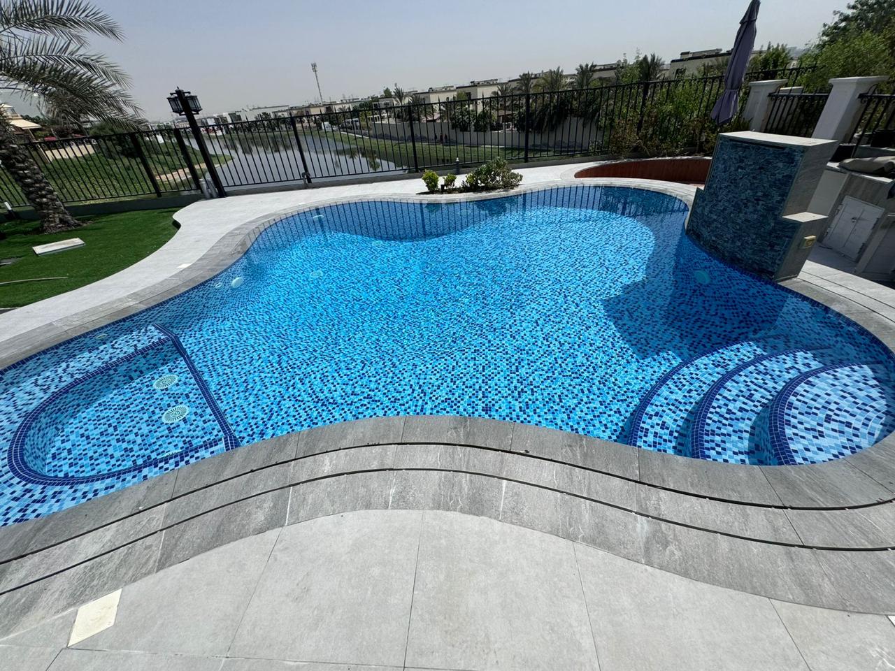 Modern house exterior with lawn